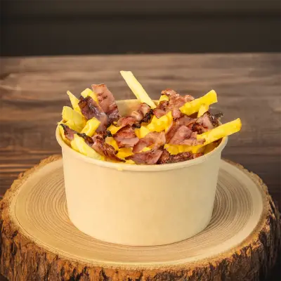 Patatas con queso cheddar y bacon